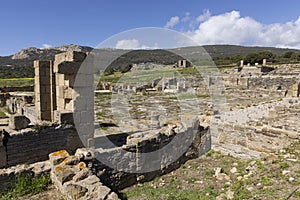 Roman castrum archeological ruins at Baelo Claudia with stone columns and antique buildings photo