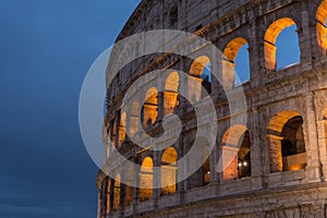 Roman Colosseum or Coliseum at dusk in Rome