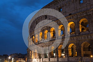 Roman Colosseum or Coliseum at dusk in Rome, Italy