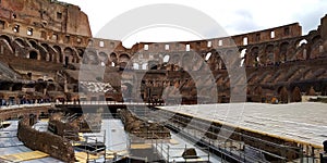 Roman Colosseum interior, Roma, Italy with Tourist