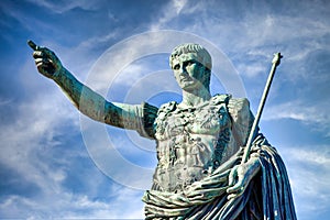 The roman emperor Gaius Julius Caesar statue in Rome, Italy. Concept for authority, domination, leadership and guidance