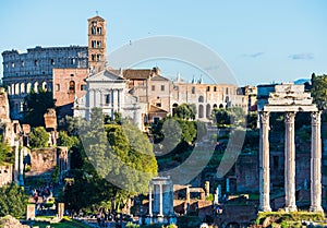 Roman Forum in Rome, Italy with ancient columns and Colosseum