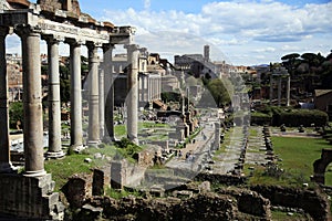 The Roman Forum ruins with the Temple of Saturn and the Dioscuri, the Basilica Julia, and the Palatine Hill, Rome, Italy