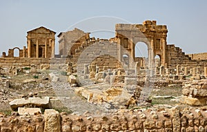 Roman Forum of Sufetula. Arch of Antoninus Pius and Capitoline Temples of Sufetula. Tunisia photo