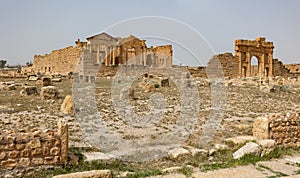 Roman Forum of Sufetula. Arch of Antoninus Pius and Capitoline Temples of Sufetula. Tunisia photo