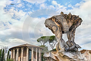 Roman Fountain of Tritons (by Carlo F. Bizzaccheri ) and Basilica of Saint Mary in Cosmedin