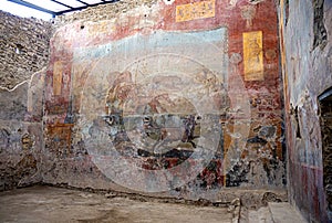 Roman frescoes in the ancient ruins of the City of Pompei, Naples, Italy