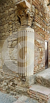 Roman like colomn in alcazaba moorish fort