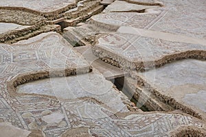 Roman mosaic tiles and hypocaust in La Olmeda village. Spain