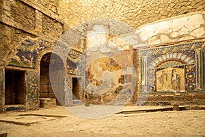A Roman mosaic on a wall in the House of Neptune and Amphitrite.  Ruins of ancient roman town Ercolano - Herculaneum