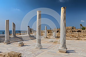 Roman old marbe column square in Caesarea Archaeological site, Israel