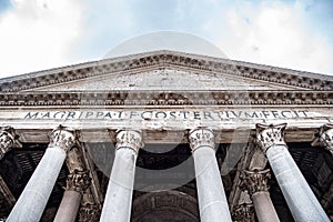 Roman Pantheon - detailed front bottom view of entrance with columns and tympanum. Rome, Italy