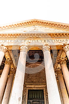 Roman Pantheon - detailed front bottom view of entrance with columns and tympanum. Rome, Italy