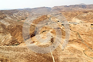 Roman Ramp at fortress Masada and Panorama of Judaean Desert mountains, Israel