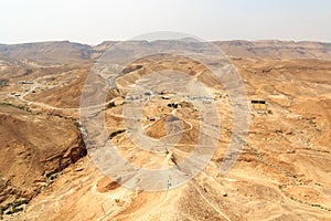 Roman Ramp at fortress Masada and Panorama of Judaean Desert mountains, Israel