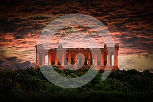 Roman ruins at Agrigento Sicily at sunset photo