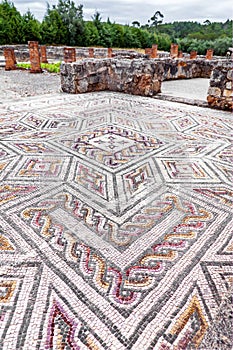 Roman ruins of Conimbriga. Complex and elaborate Roman tessera mosaic pavement in the House of the Swastika