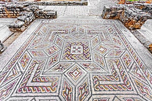 Roman ruins of Conimbriga. Complex and elaborate Roman tessera mosaic pavement in the House of the Swastika