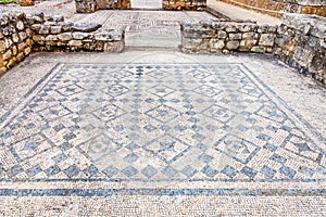 Roman ruins of Conimbriga. Room decorated with monochrome Roman mosaic