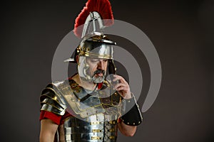 Roman soldier in actitude of refleccion photo
