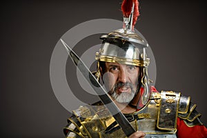 Roman soldier holding his sword