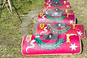 Roman soldiers` shields lying on ground before reenactment battle