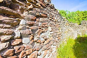 Roman stone and brick damaged wall Italy