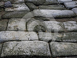 Roman stone path at Old Mosque of Bab al-Mardum or Hermitage of Cristo de la Luz. Historic city of Toledo. Spain photo