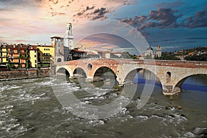 The roman Stone Wall Bridge Ponte Pietra over the Adige River. Verona, Italy, Europe.