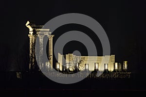 Roman temple illuminated at night