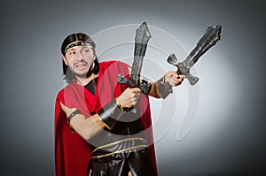 The roman warrior with sword against background