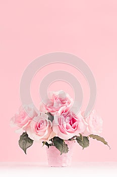 Romance celebration flowers background - pink luxury roses bouquet on white wood board, copy space.