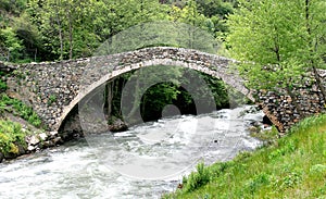 A romanesque bridge in Andorra photo