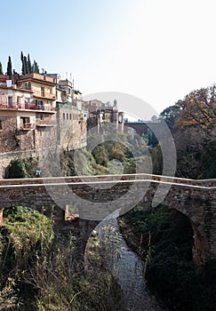 Romanesque bridge of Caldes de Montbui. Medieval roman village in Catalonia, Spain photo