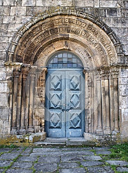 Romanesque door of Paderne monastery photo