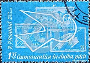 Romania - Circa 1962: a postage stamp printed in the Romania showing an airmail stamp for an exhibition: Dove and space stamps of