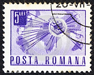 ROMANIA - CIRCA 1967: A stamp printed in Romania shows a Telex instrument and world map, circa 1967.