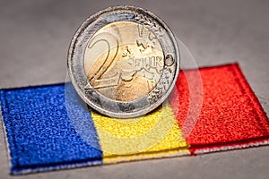 Romania euro, Romania joining the euro zone, Romanian flag and 2 euro coin, Financial concept, Currency exchange in the European