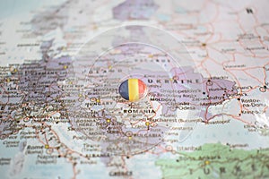 Romania flag drawing pin on the map