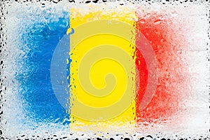 Romania flag. Flag of Romania on the background of water drops. Flag with raindrops. Splashes on glass