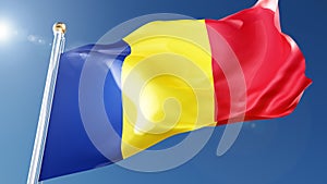 romania flag waving in the wind against a blue sky. romanian national symbol on flagpole, 3d rendering