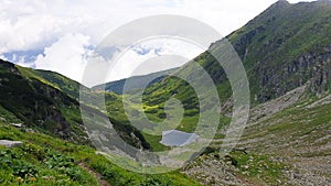 Romania, Rodnei Mountains, Iezerul Lake. This lake has the shape of Romania country. photo