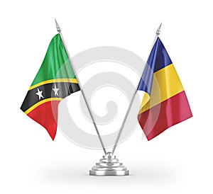 Romania and Saint Kitts and Nevis table flags isolated on white 3D rendering