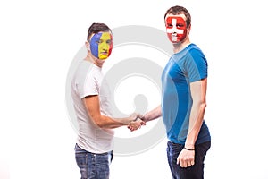 Romania vs Switzerland friendly handshake egual game on white background.