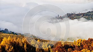 Romania wild Carpathian mountains with mist in the autumn time landscape