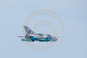 Romanian Air Force Mig-21 Lancer performing a demostration flight at Timisoara Airshow photo