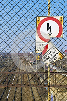 Romanian broken sign showing risk of electric shock