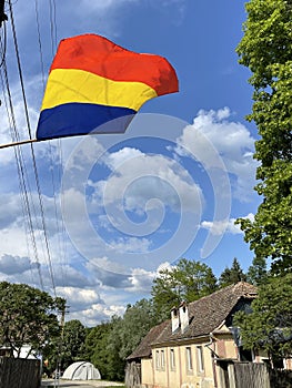 The Romanian flag flies in a Saxon village in Transylvania