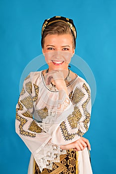 Romanian folklore clothes traditional on blue azzure background photo