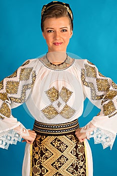 Romanian folklore clothes traditional on blue azzure background photo